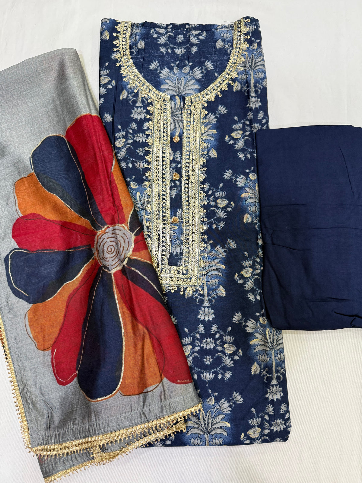 Embroidered muslin set with bold print dupatta