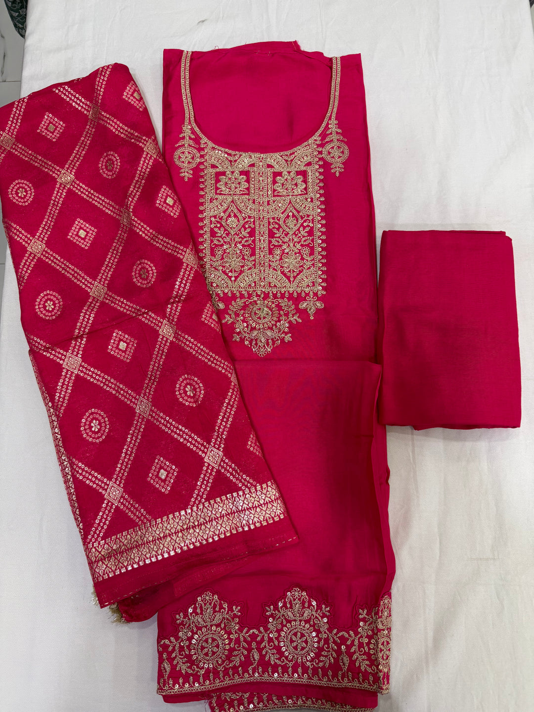 Premium Dola Silk Embroidered top paired with a beautiful Bandhej Dupatta