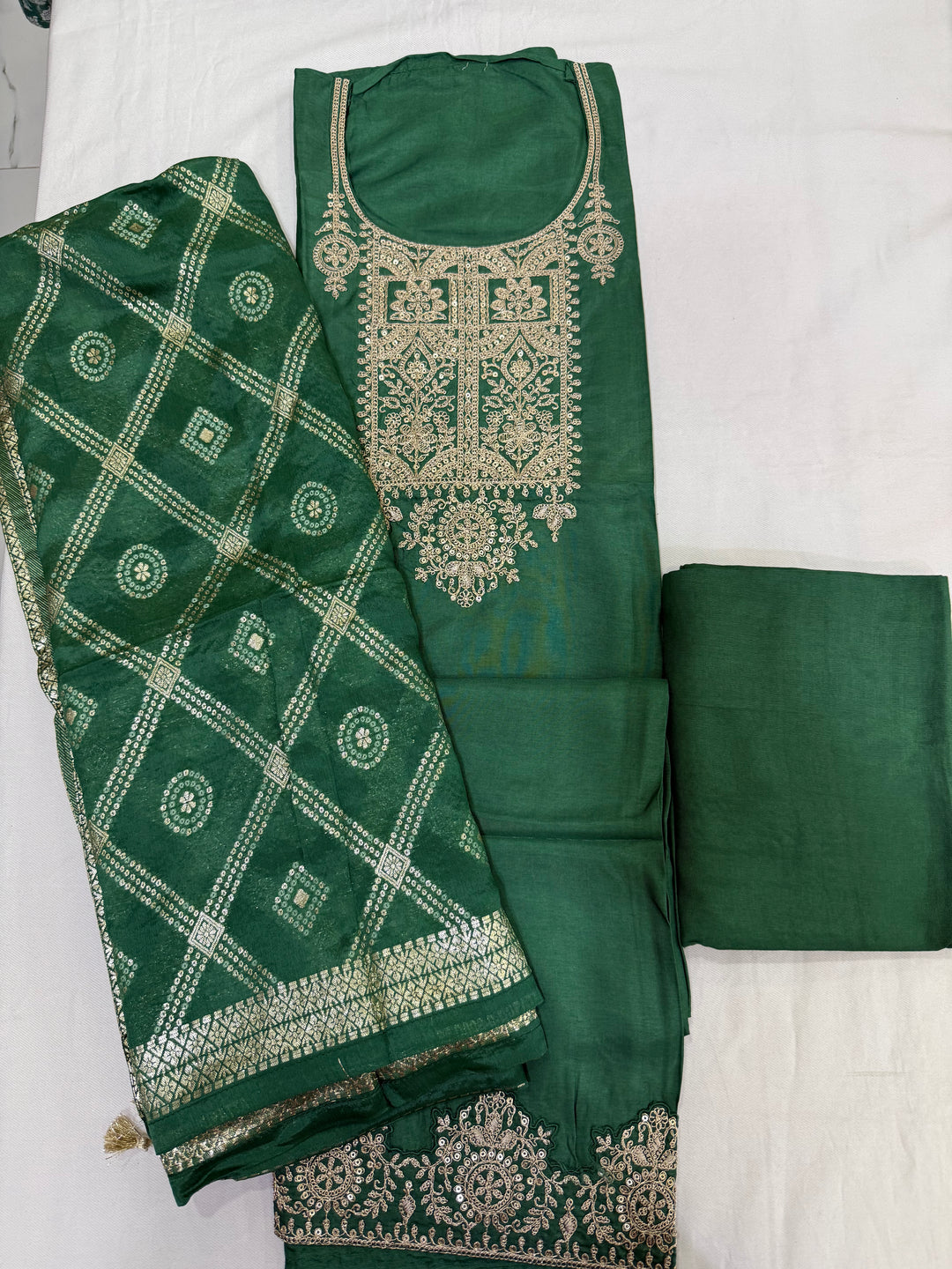 Premium Dola Silk Embroidered top paired with a beautiful Bandhej Dupatta